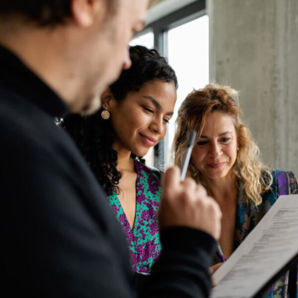 Lawyers studying a document together